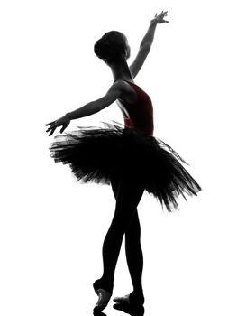 one caucasian young woman ballerina ballet dancer dancing with tutu in silhouette studio on white background