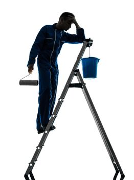 one caucasian man house painter worker silhouette in studio on white background