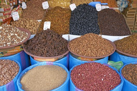 Dried fruits, nuts and grain for sale in a shop in the historic medina of Fes in Morocco