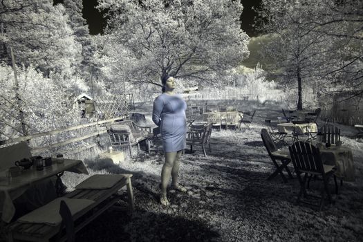 Woman standing in the sun infrared filter