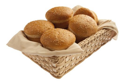 Scrumptious baked buns in basket isolated on white background 