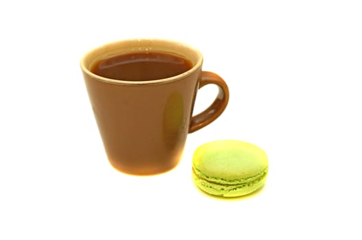 Cup of coffee with macaroon