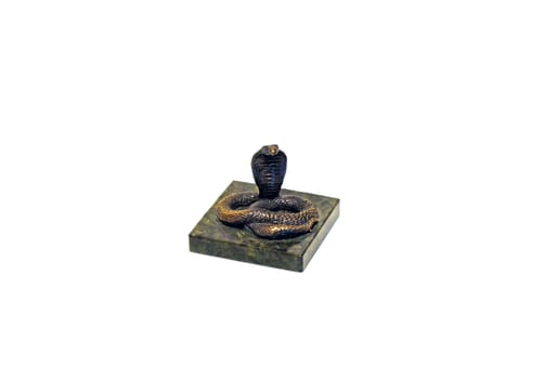   Figure bronze snake on a piece of green marble                             
