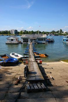 Houses and scrappy pontoon bridge on Sava river,Belgrade,Serbia