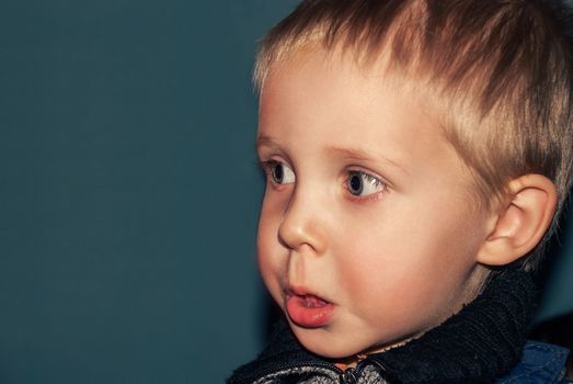 Children and funny portrait of a young boy closeup