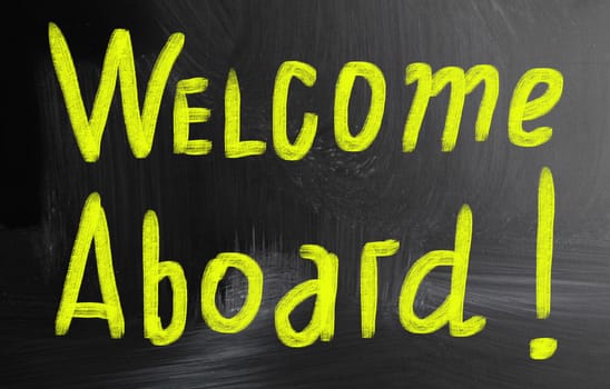 welcome aboard handwritten with chalk on a blackboard