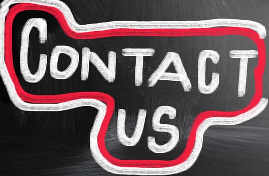 contact us handwritten with chalk on a blackboard