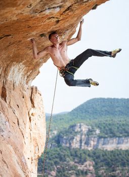 Rock climber a face of a cliff