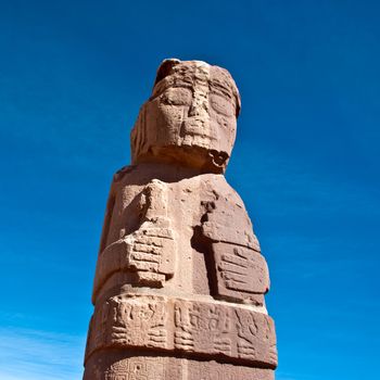 Monolith at Tiwanaku, Altiplano, Titicaca region, Bolivia - One of two large anthropomorphic figures still standing on the Kalasasaya mound. Tiwanaku - ancient city in Bolivia, 72 km from La Paz, near the eastern shore of Lake Titicaca. Dated 12-17 century BC.