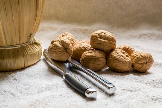 Set with some walnuts and a nutcracker