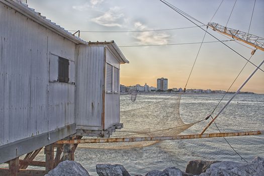 Fishing hut in the harbour channel of Cervia in Northern Italy on the Adriatic Sea