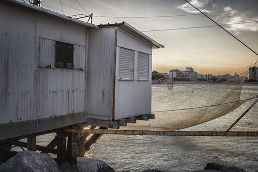 Fishing hut in the harbour channel of Cervia in Northern Italy on the Adriatic Sea