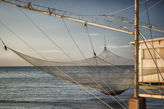 Fishing hut in the harbour channel of Cervia in Northern Italy on the Adriatic Sea