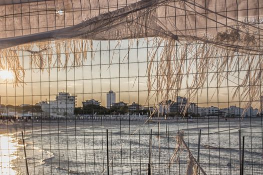 Bay of of Cervia in Northern Italy on the Adriatic Sea through an iron grid