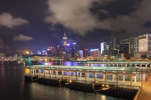Hong Kong Central Ferry Pier with City Skyline at Night