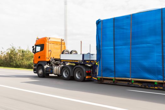 Truck delivery oversized cargo on the road