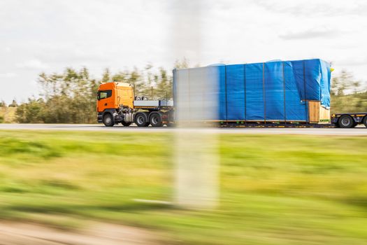 Truck delivery oversized cargo on the road