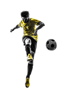 one brazilian soccer football player young man kicking in silhouette studio on white background