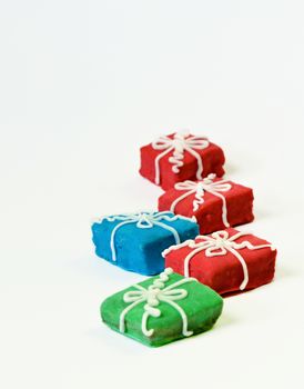 brightly colored sugar cookies on a white background