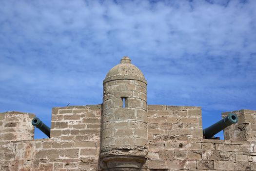Fortified tower guarding the historic fishing port of Essaouira in Morocco.