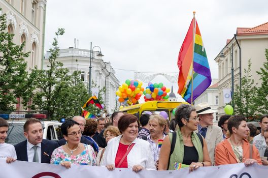 VILNIUS, LITHUANIA - JULY 27: Famous politics people in beginning of gay parade crowd members on July 27, 2013 in Vilnius. Fight for gay and lesbian equality rights.