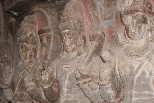 Carvings of religious figures inside a Buddhist rock cave (Teen Daal). Cave number 12, Ellora Caves, near Aurangabad, India. 7th - 8th Century AD