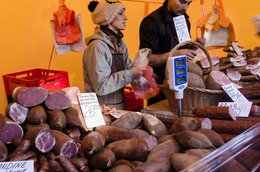 BIRZAI, LITHUANIA - OCTOBER 05: farmers sells smoked meat products assortment, bacon ham sausages on October 05, 2013 in Birzai.