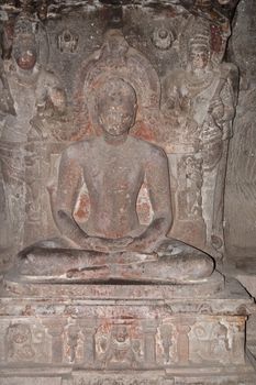 Religious images carved into solid rock inside an ancient Hindu cave temple, Ellora Caves near aurangabad, India.