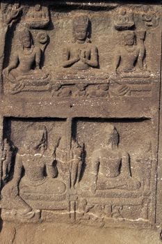 Religious carving around the entrance to a Buddhist cave temple at Ellora Caves in India. Vishwakarma Temple, Cave 10, 7th-8th Century AD