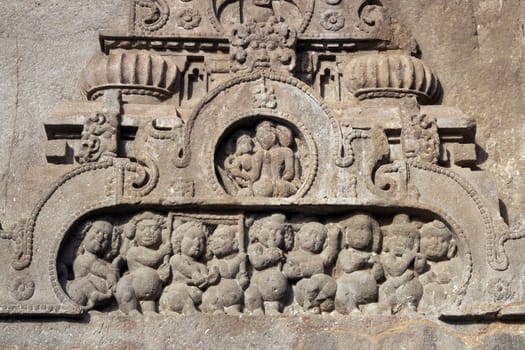 Religious carving around the entrance to a Buddhist cave temple at Ellora Caves in India. Vishwakarma Temple, Cave 10, 7th-8th Century AD