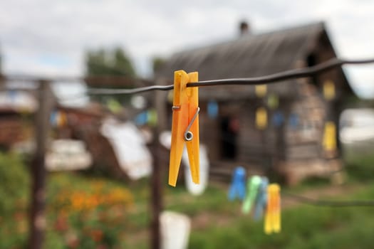 colorful clothespins a wire Tilt  shot