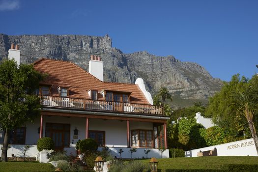 Large residential house nestling below Table Mountain in Cape Town, South Africa