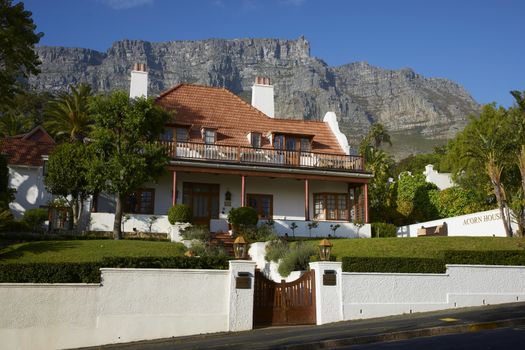 Large residential house nestling below Table Mountain in Cape Town, South Africa