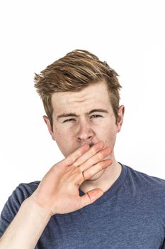 portrait of cool boy with red hair posing in studio