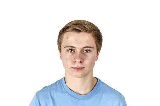 portrait of cool boy with blue shirt posing in studio