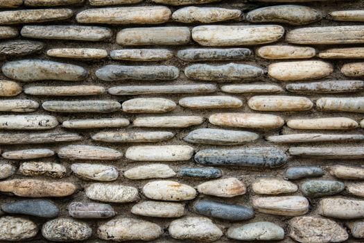 pattern gray color of modern style design decorative uneven cracked real stone wall surface with cement