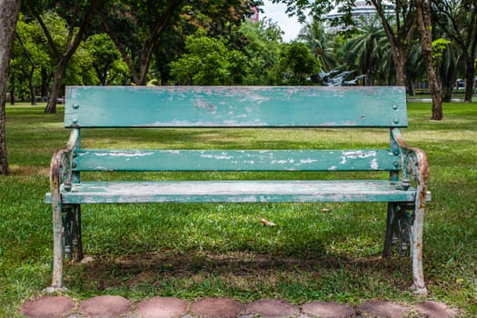 wooden park bench at a park