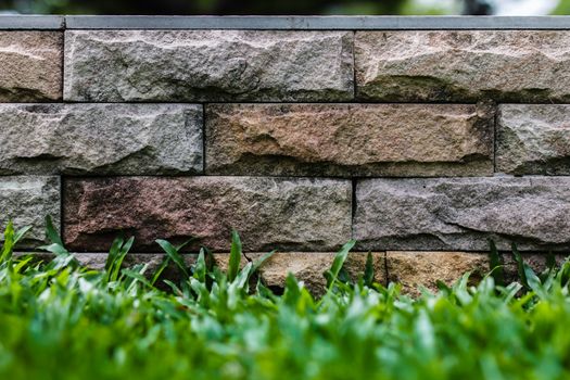 grass and stone wall background,rock wall
