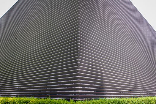texture of steel ventilation grille on the wall of a building