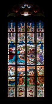 Detail of the color window - bullseye pane - lattice window. Public national monument - cathedral of St Barbara, Kutna Hora, Czech republic, Europe.