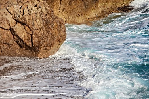 Waves hitting the rocky shore