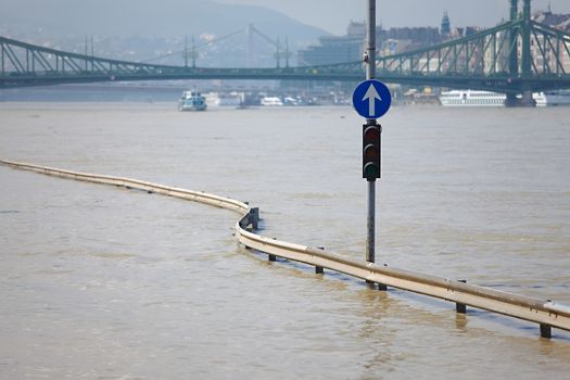 Flooded street n Budapest with traffic sign