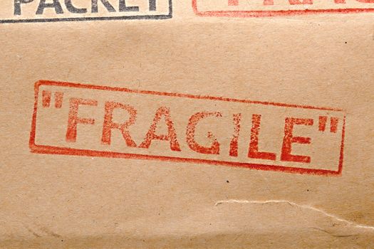 Fragile stamp on a delivery pack