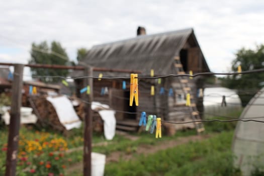 colorful clothespins a wire Tilt  shot