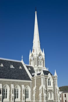 Dutch Reformed Church in Graaff-Reinet, Eastern Cape, South Africa. Imposing building in Cape Dutch style with tall steeple.