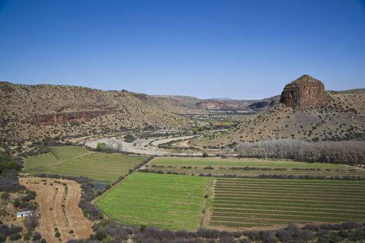 Farming in a wide river valley in the Karoo. South Africa