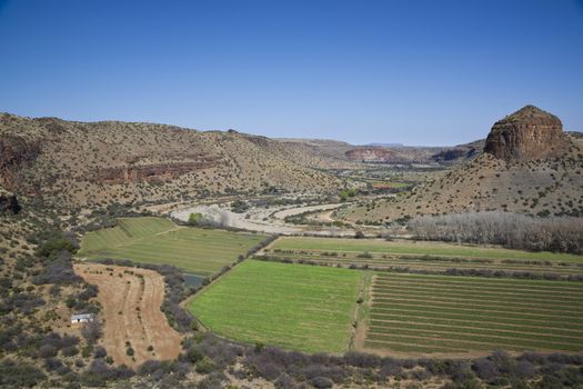 Farming in a wide river valley in the Karoo. South Africa