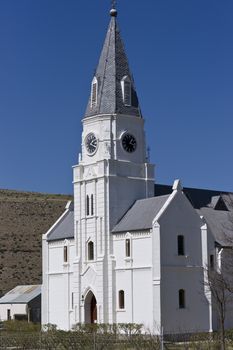 Old church in Dutch Cape style in the remote town Nieu Bethesda in the Karoo area of the Eastern Cape, South Africa
