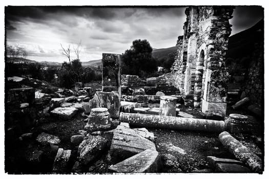 Black and white Pillar ruins at Ancient Troizina , Peloponnese, Greece