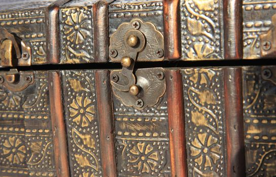 Closeup of wooden handmade decorative box on the table